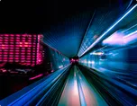 Futuristic transit tunnel with motion light trails