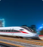 High-speed train in motion at dusk