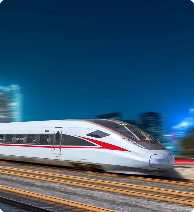 High-speed train in motion at dusk